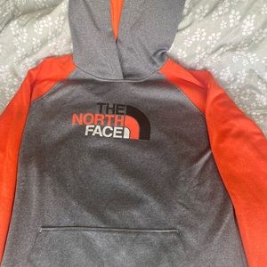 NWO tags The North Face women’s hoodie.